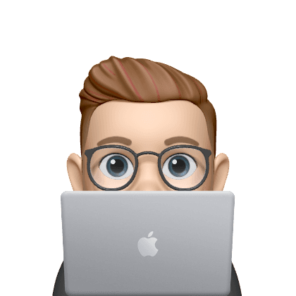 Person peeking behind laptop